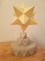 Small stellated dodecahedron atop an octahedron atop a hexagonal antiprism atop a duodecagonal antiprism