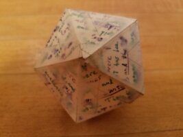 Icosahedron covered with text